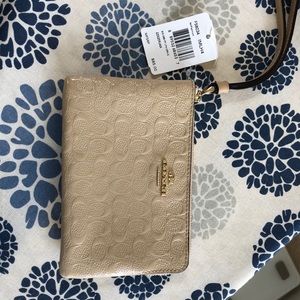 Coach wallet beige in top condition still has tag